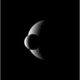Illustration for article titled Double Moon Transit Glows In Saturns Night Sky